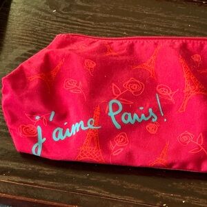 Lancôme pouch, purse or makeup, actually raspberry color with orange pattern